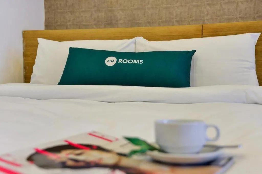 Bed in AHA Boutique Ben Thanh Hotel