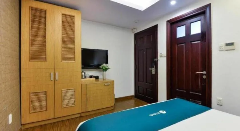 Bed in AHA Boutique Ben Thanh Hotel