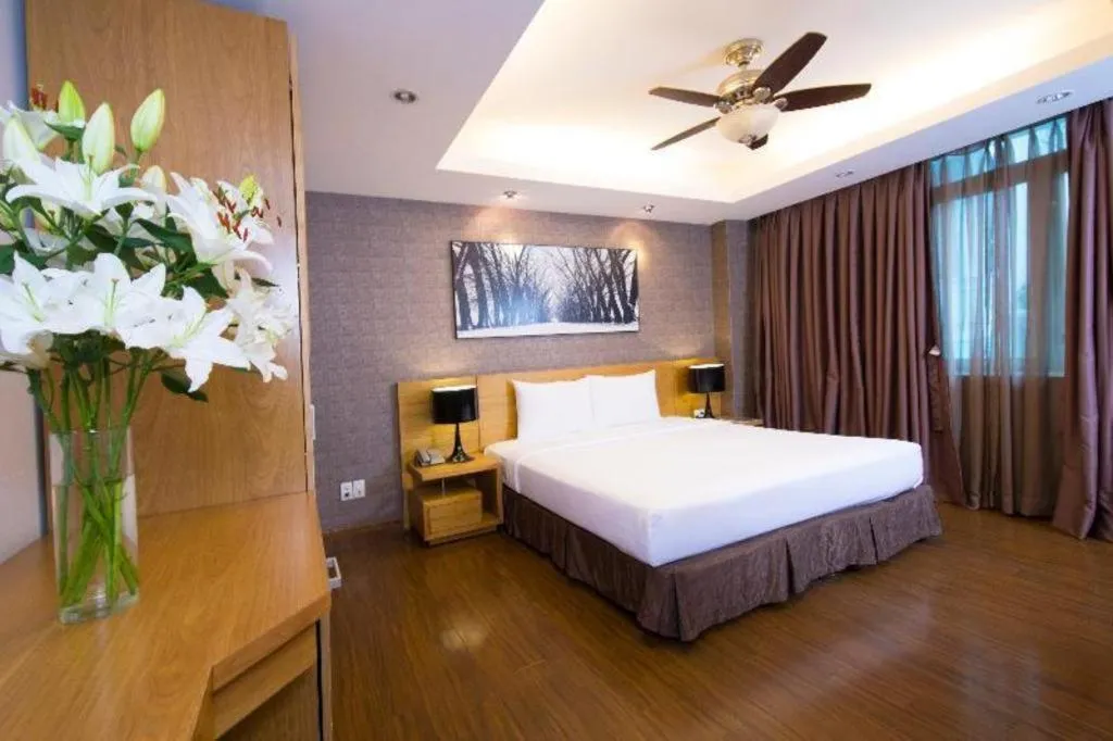 Bed in AHA Boutique Ben Thanh Hotel
