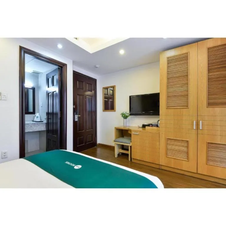 Bed in AHA Boutique Ben Thanh Hotel