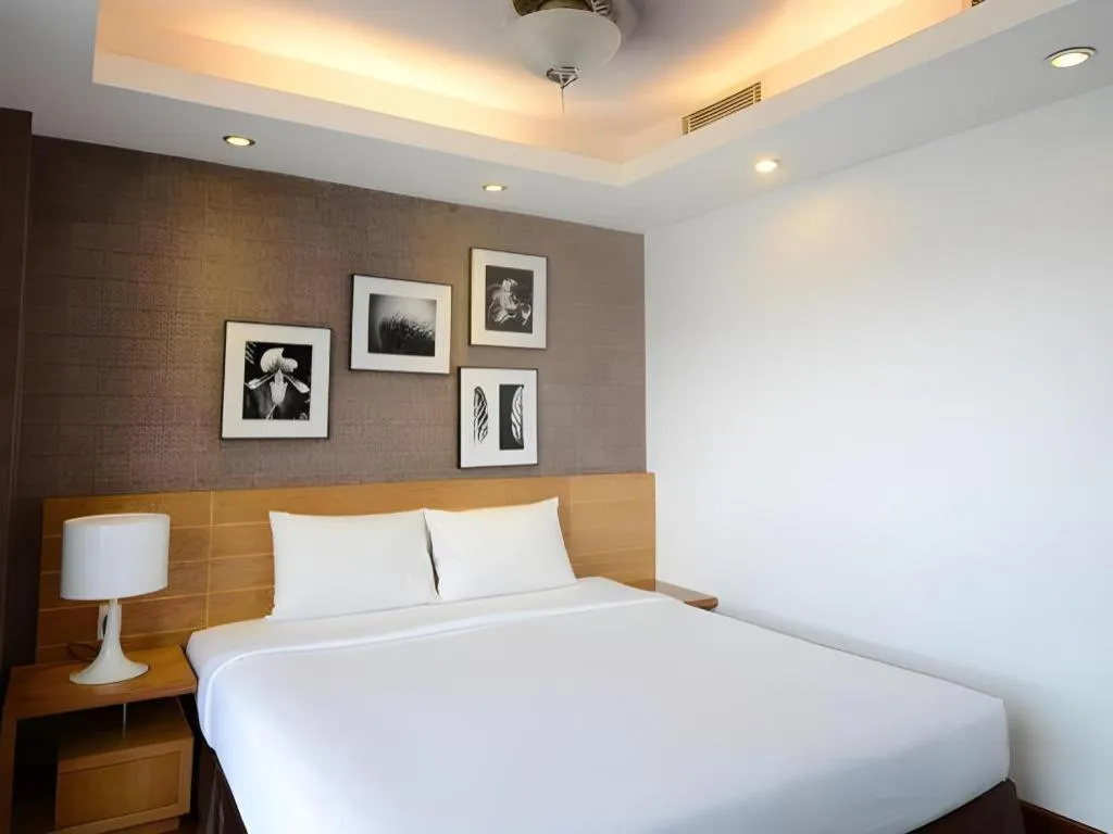 Bed in AHA Boutique Ben Thanh Hotel