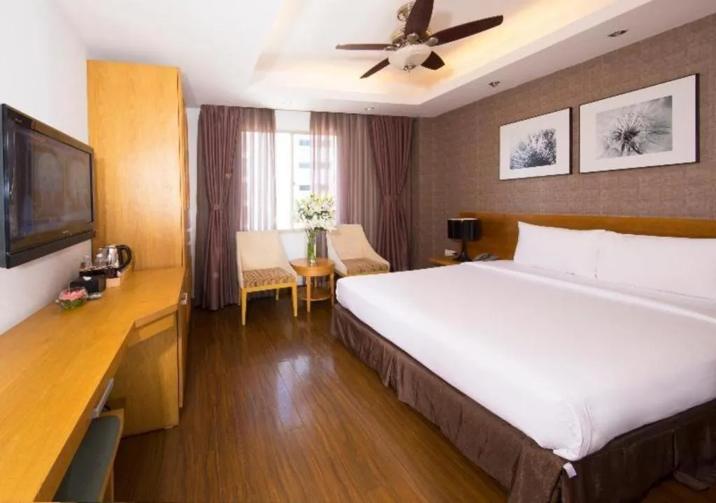 Bed in AHA Boutique Ben Thanh Hotel