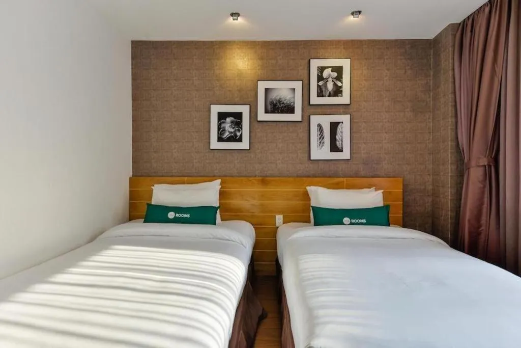 Bed in AHA Boutique Ben Thanh Hotel