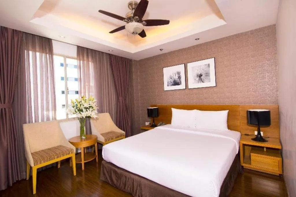 Bed in AHA Boutique Ben Thanh Hotel