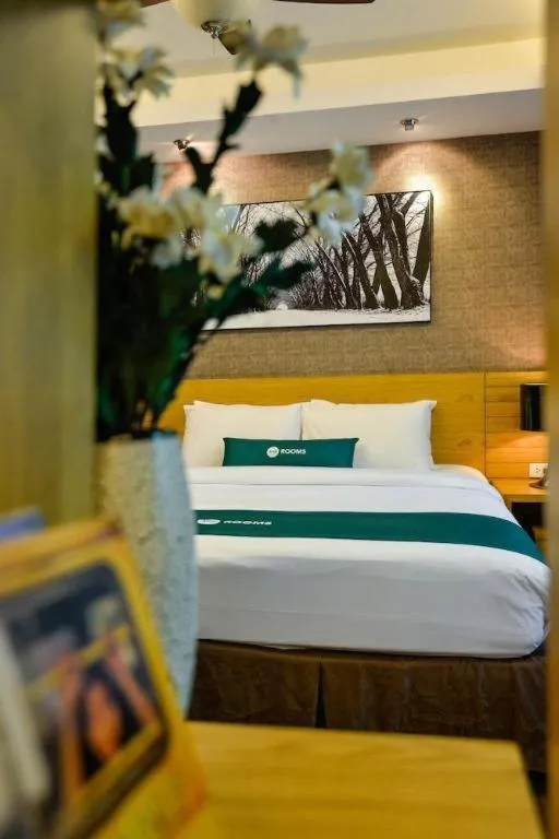 Bed in AHA Boutique Ben Thanh Hotel