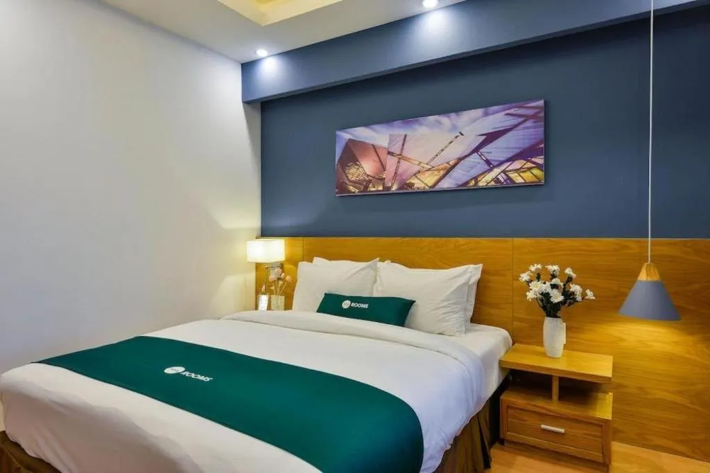 Bed in AHA Boutique Ben Thanh Hotel