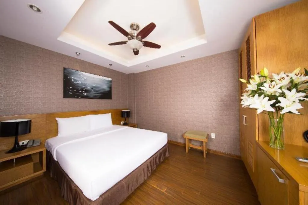 Bed in AHA Boutique Ben Thanh Hotel