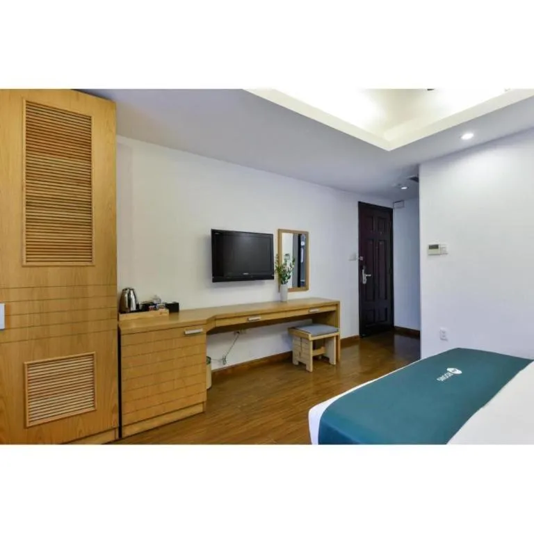 Bed in AHA Boutique Ben Thanh Hotel