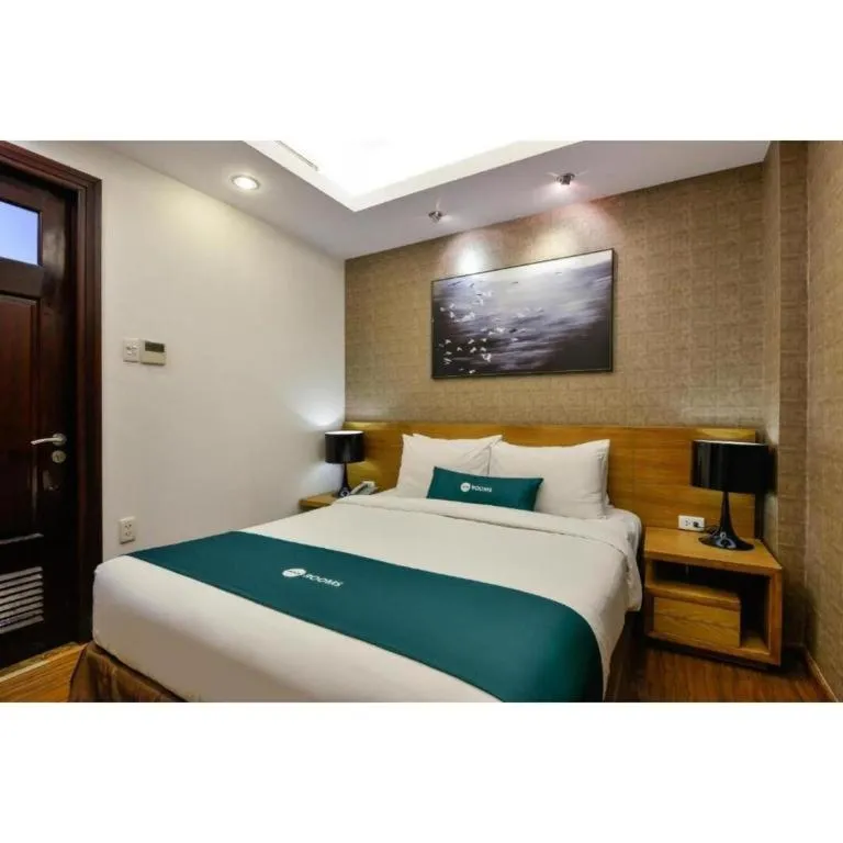 Bed in AHA Boutique Ben Thanh Hotel