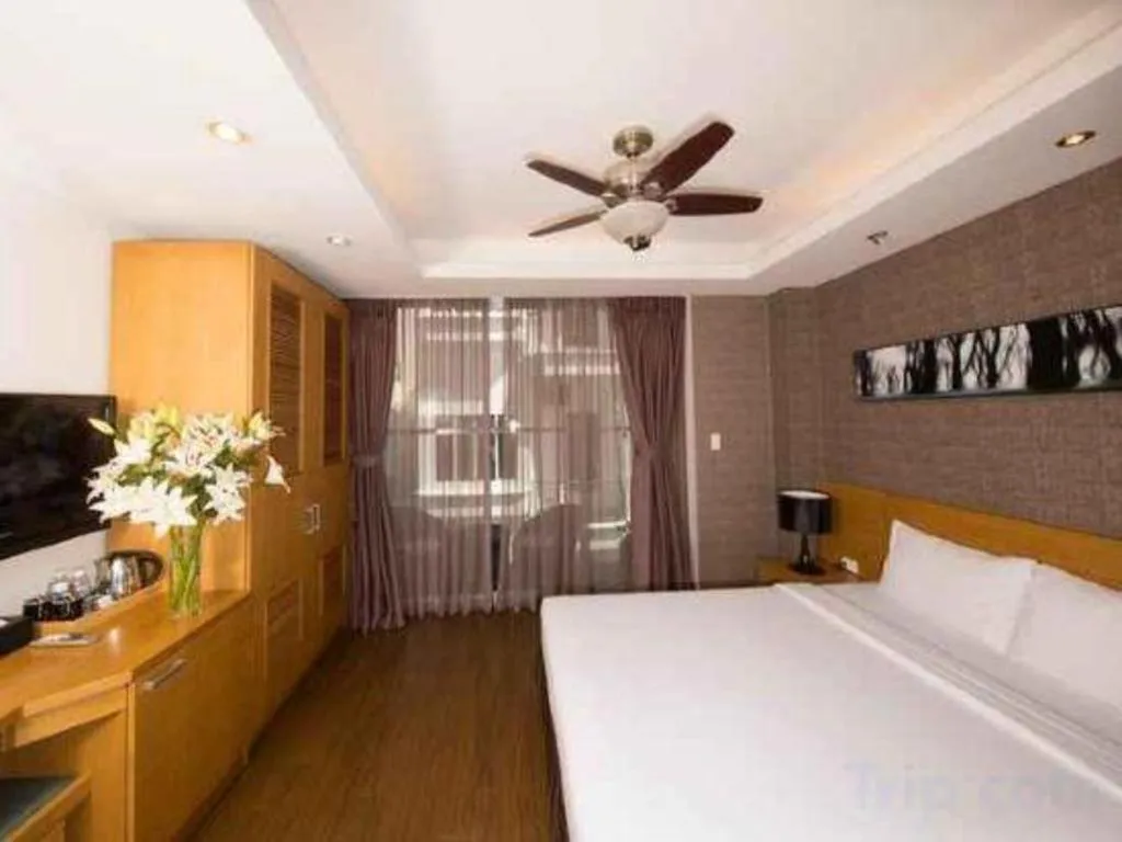 Bed in AHA Boutique Ben Thanh Hotel