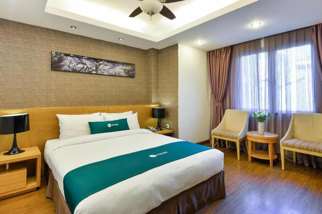 Bed in AHA Boutique Ben Thanh Hotel