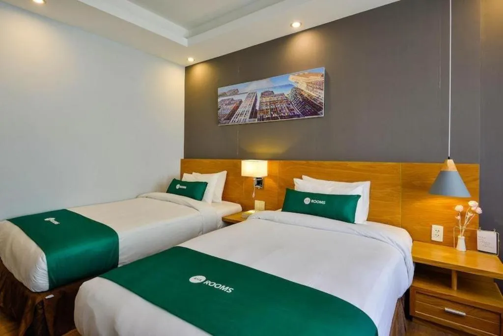 Bed in AHA Boutique Ben Thanh Hotel