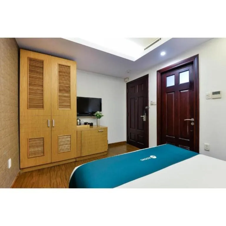 Bed in AHA Boutique Ben Thanh Hotel