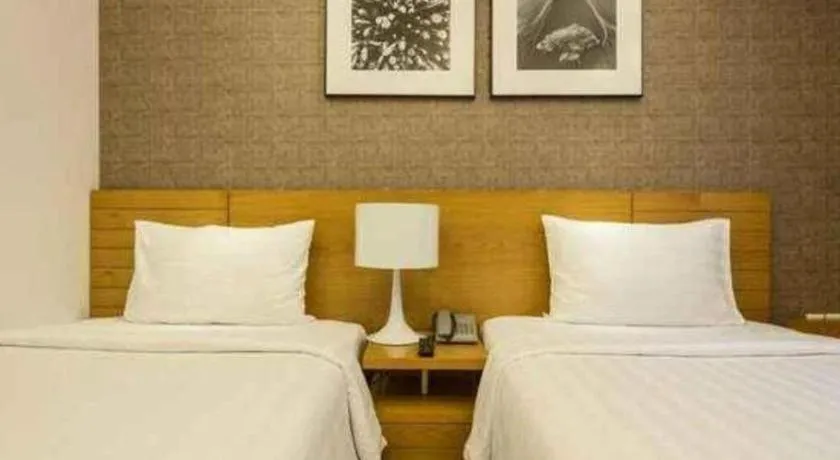 Bed in AHA Boutique Ben Thanh Hotel