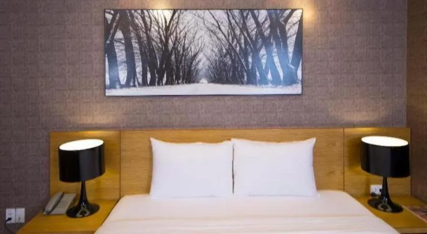 Bed in AHA Boutique Ben Thanh Hotel