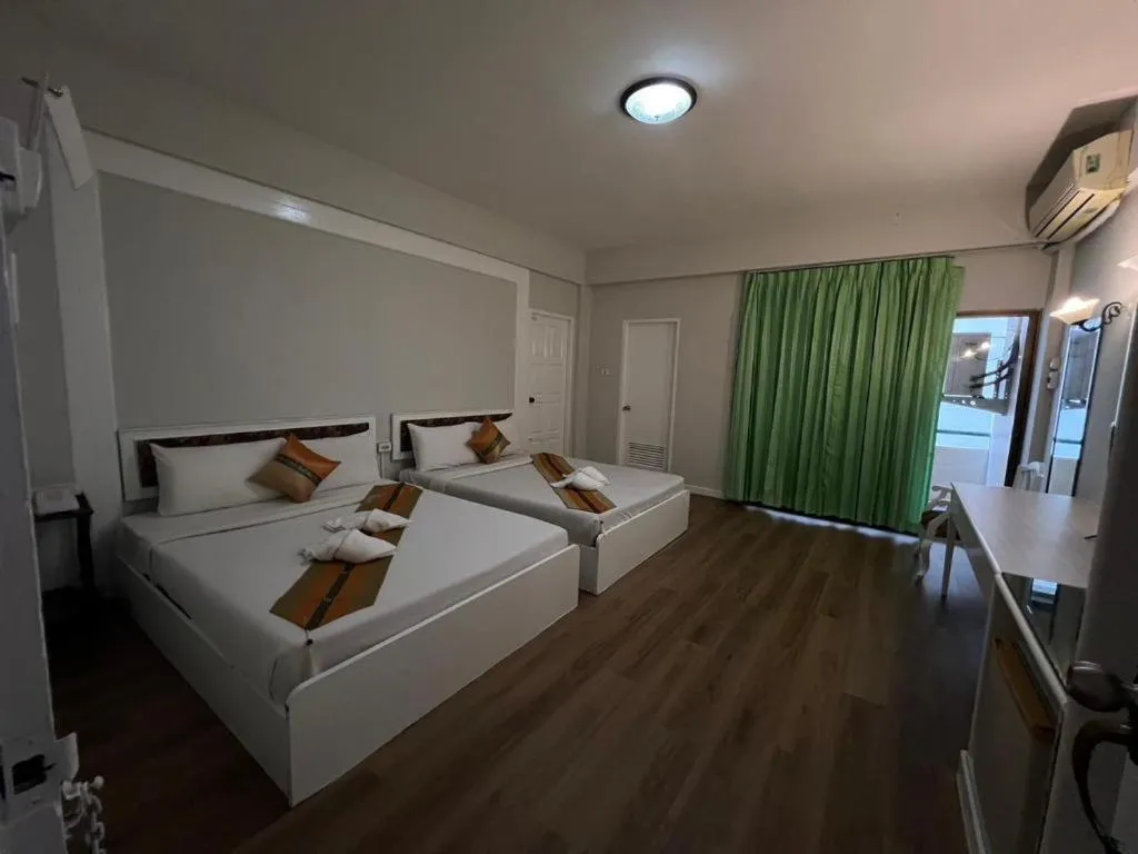 Bed in Chao Phya Grand Hotel