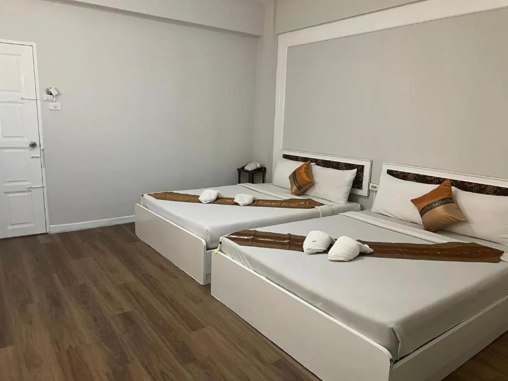 Bed in Chao Phya Grand Hotel