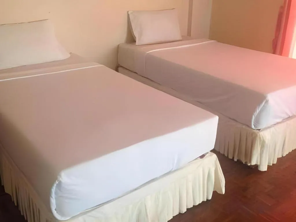 Bed in Chao Phya Grand Hotel