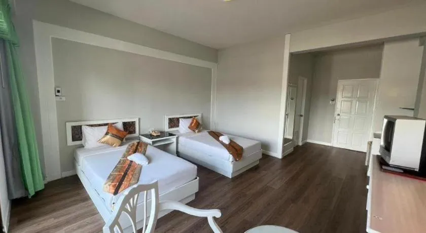 Bed in Chao Phya Grand Hotel