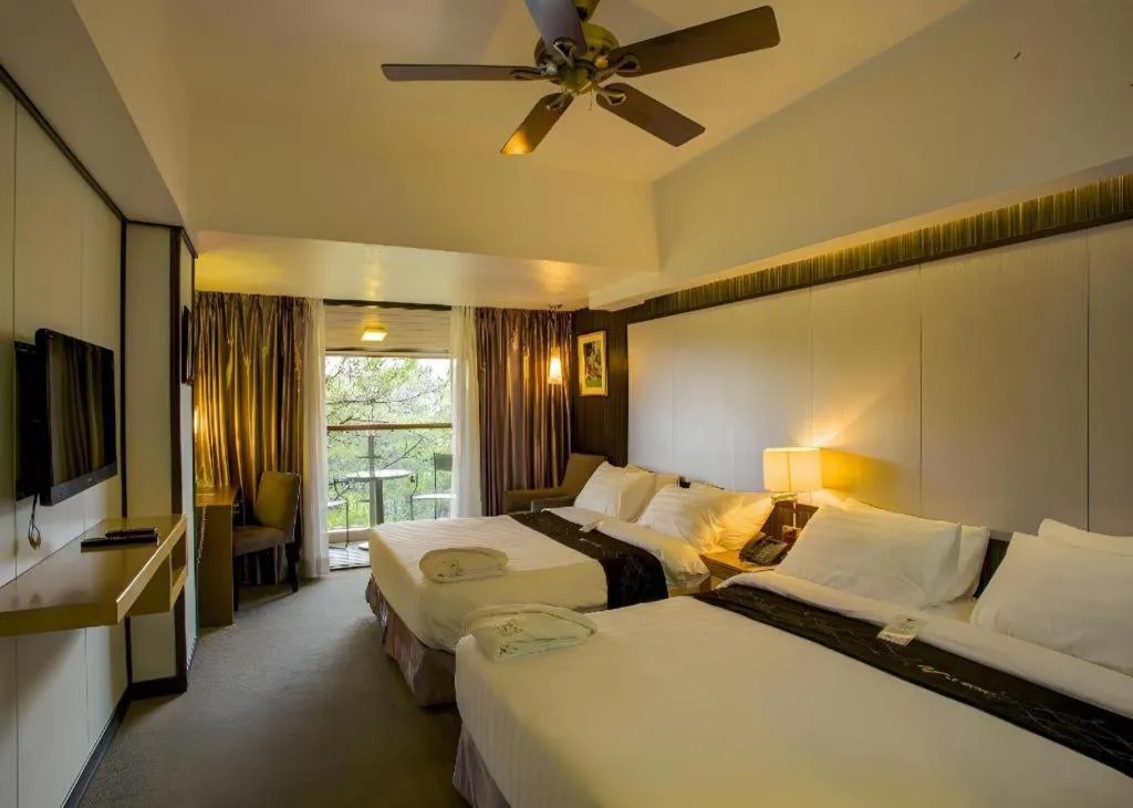 Bed in Le Monet Hotel