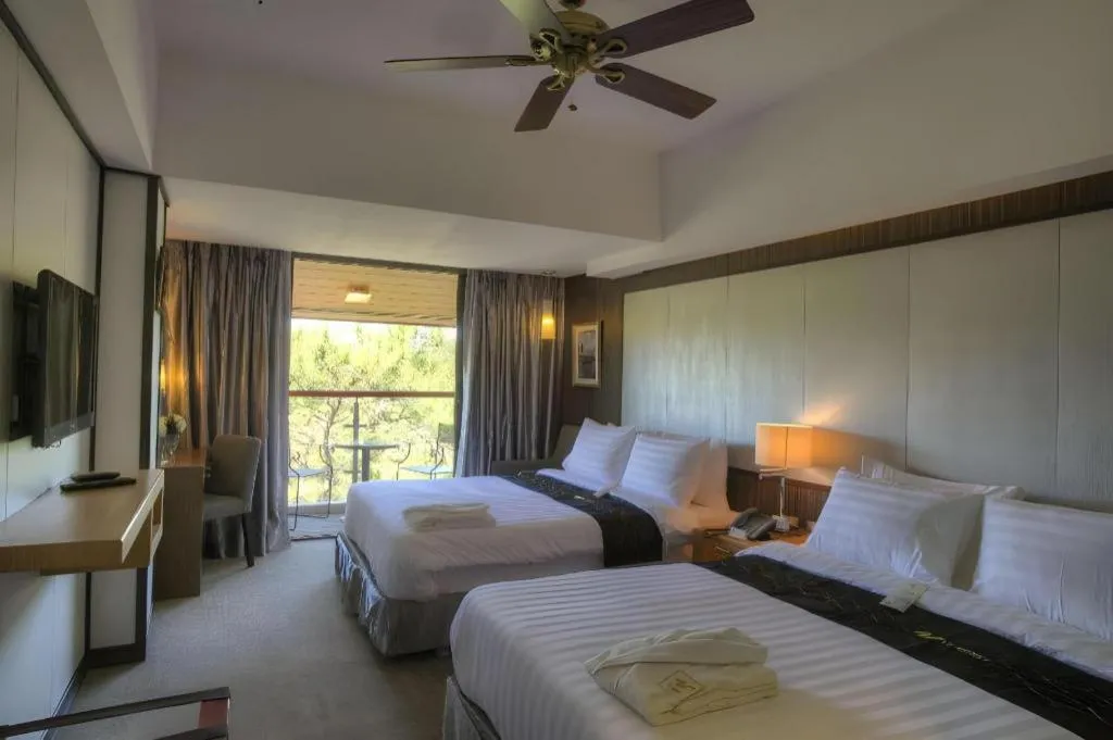 Bed in Le Monet Hotel