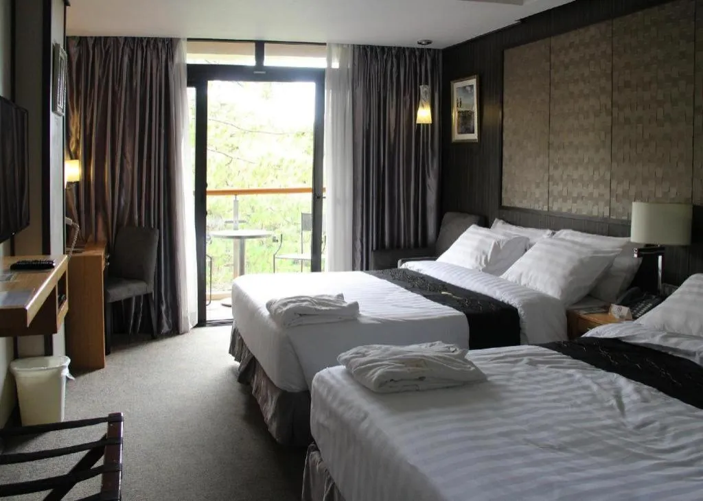 Bed in Le Monet Hotel