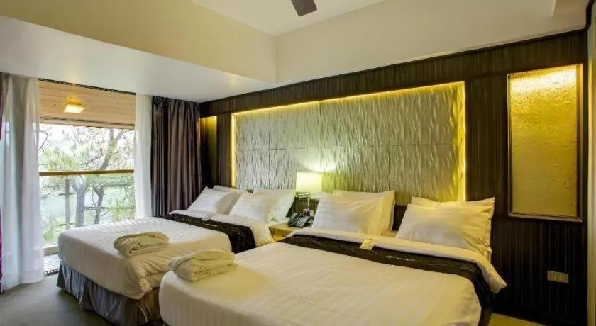 Bed in Le Monet Hotel