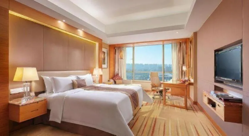 Bed in Howard Johnson by Wyndham Sunshine Plaza Ningbo
