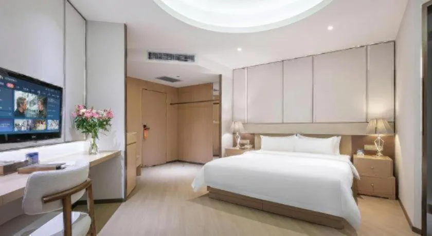 Bed in Howard Johnson by Wyndham Sunshine Plaza Ningbo