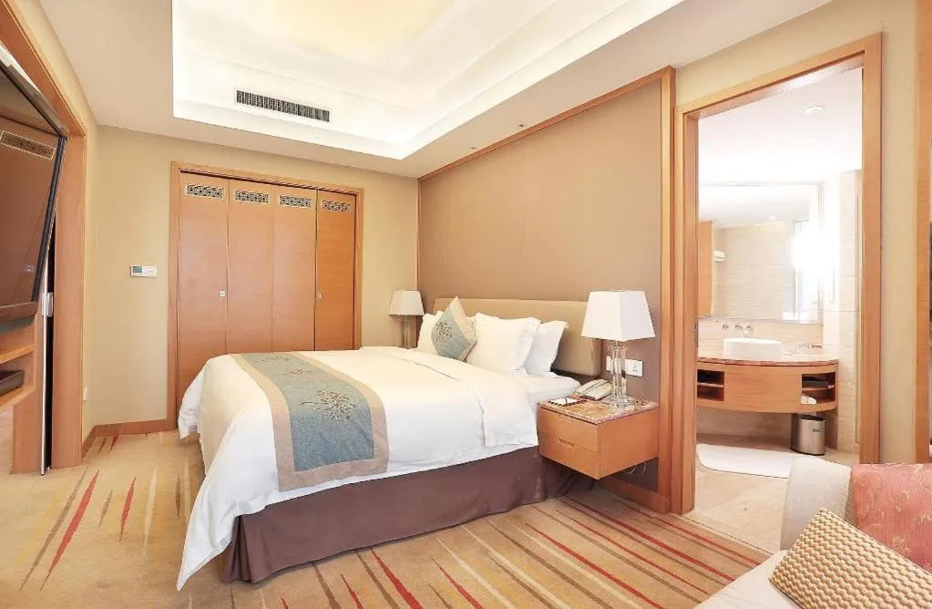 Bed in Howard Johnson by Wyndham Sunshine Plaza Ningbo