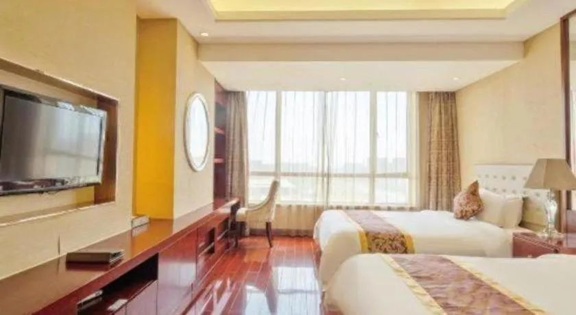 Bed in Howard Johnson by Wyndham Sunshine Plaza Ningbo