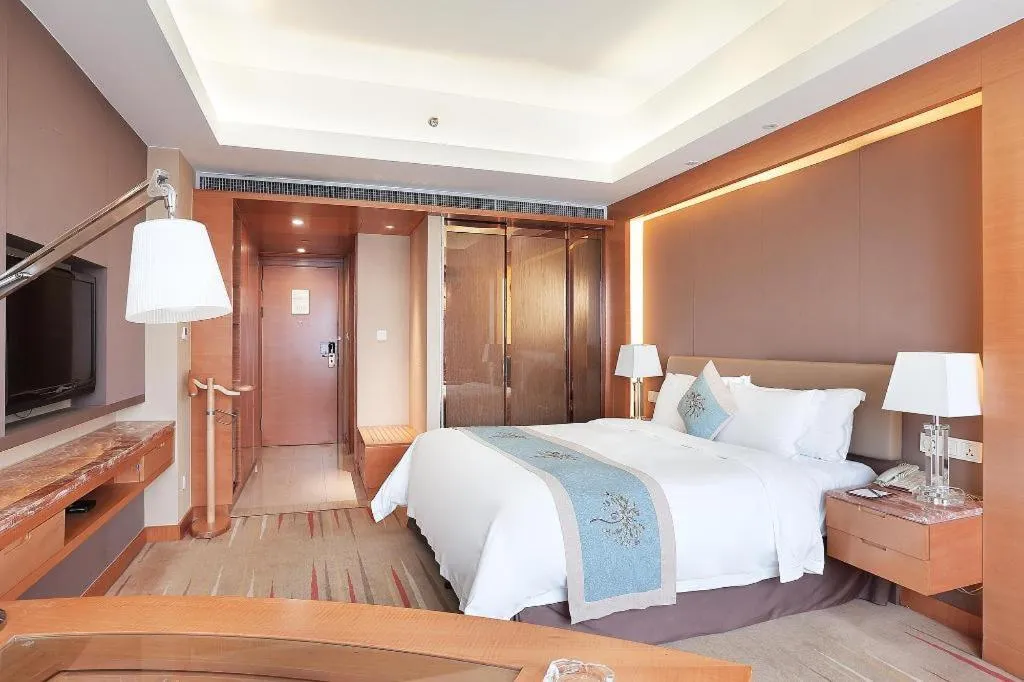 Bed in Howard Johnson by Wyndham Sunshine Plaza Ningbo