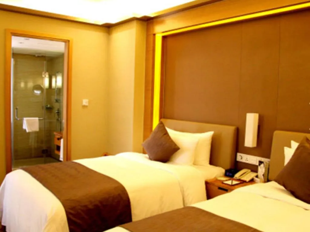 Bed in Howard Johnson by Wyndham Sunshine Plaza Ningbo