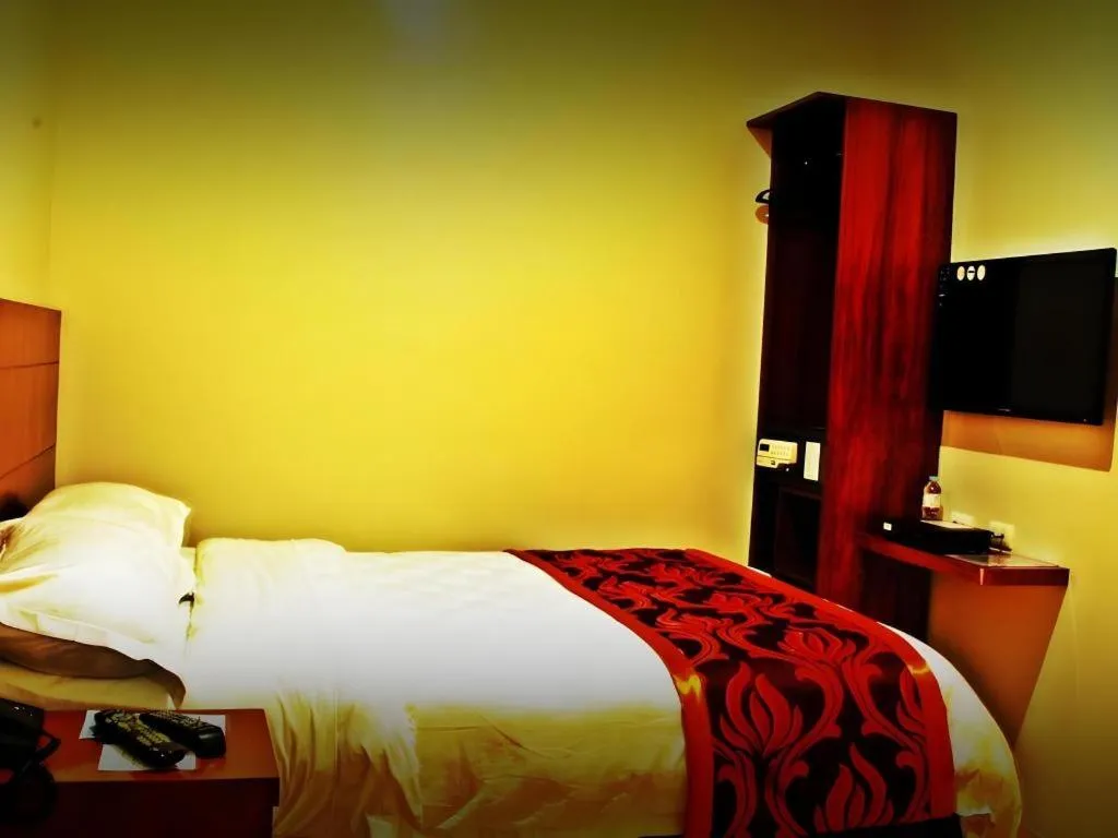 Bed in Avenue Suites