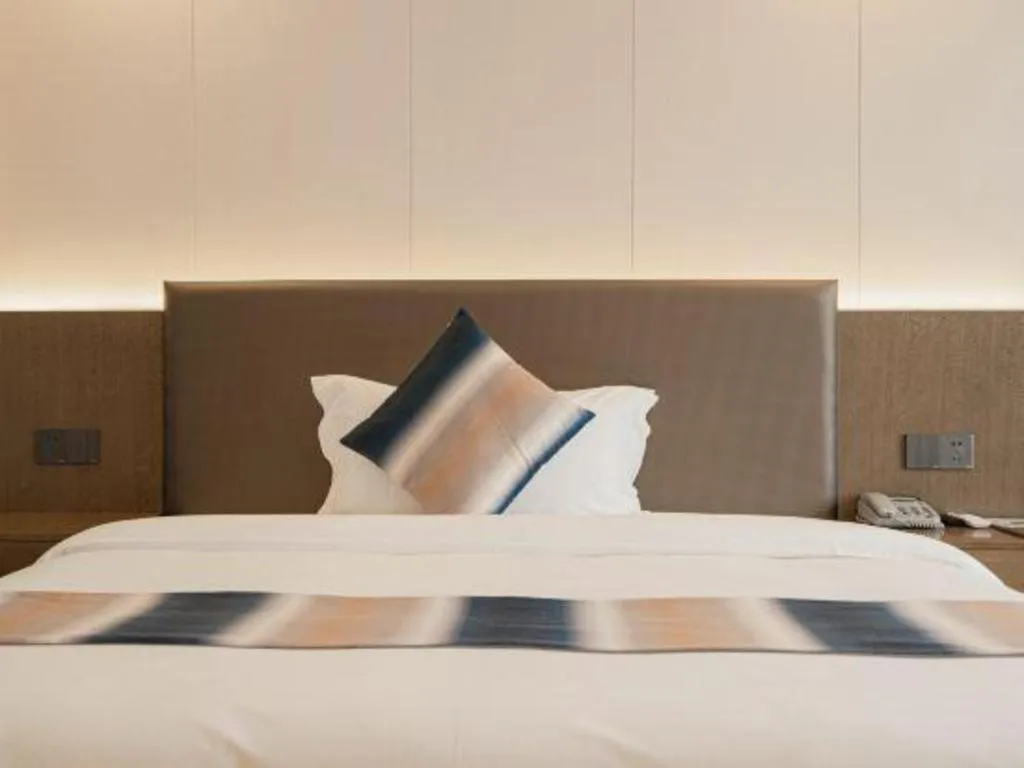 Bed in Zhangjiajie Fulante News Business Hotel