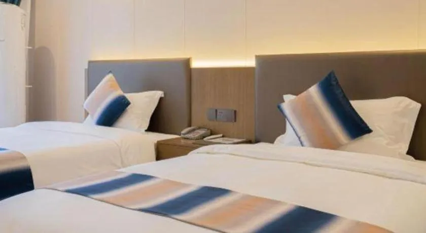 Bed in Zhangjiajie Fulante News Business Hotel