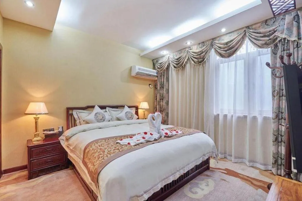 Bed in Huangshan Yupinglou Hotel