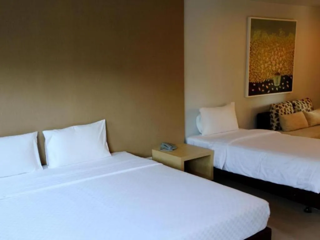 Bed in The One Residence Hotel