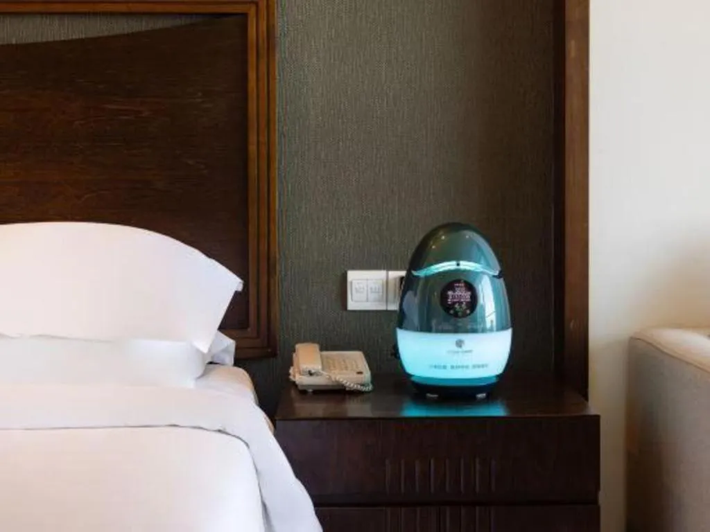 Bed in Boao Holliyard Hotel