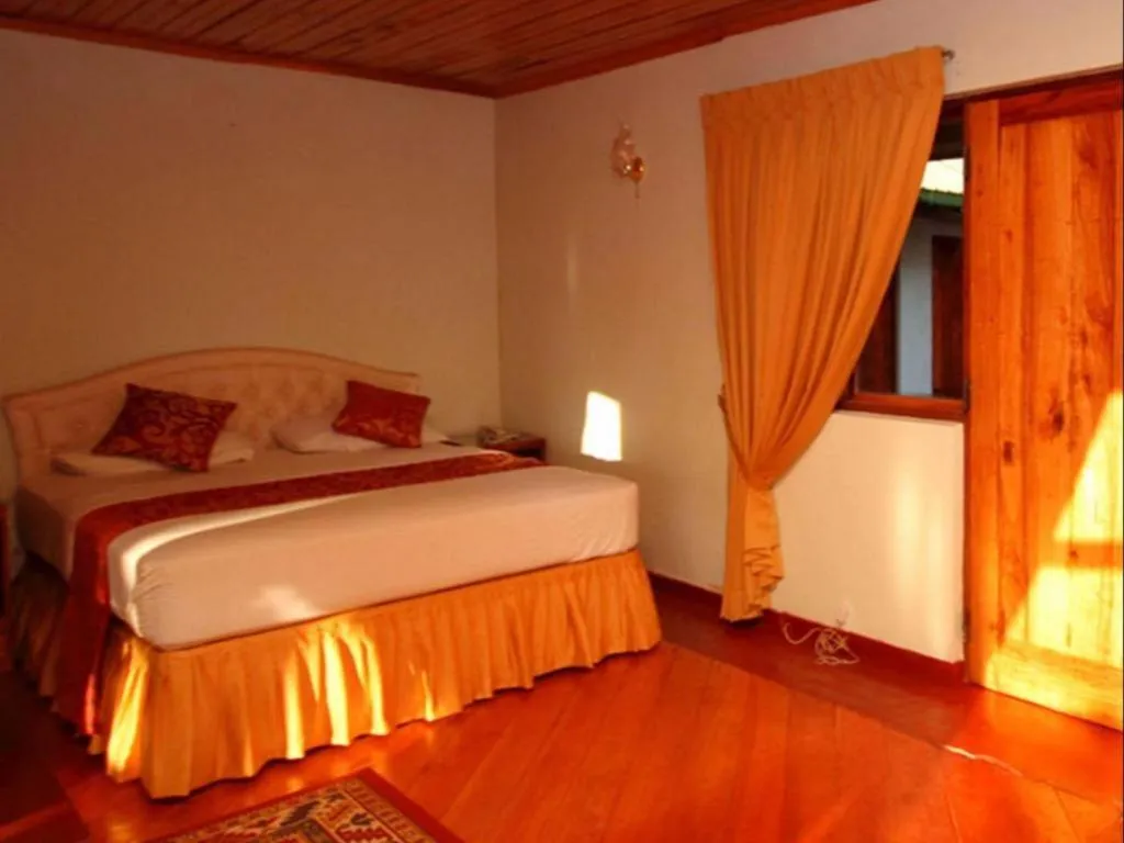 Bed in The Hideaway Hotel