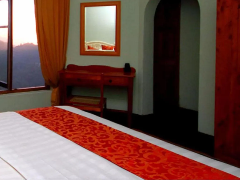 Bed in The Hideaway Hotel