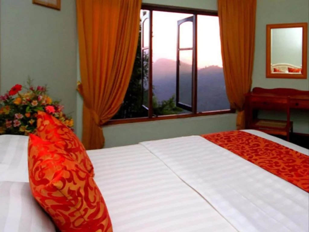 Bed in The Hideaway Hotel