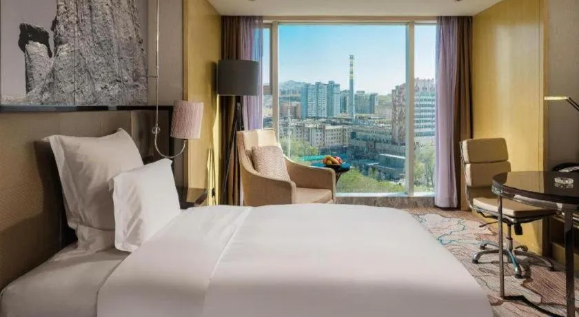 Bed in U Hotel Urumqi