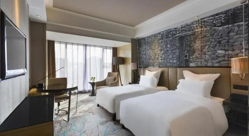 Bed in U Hotel Urumqi