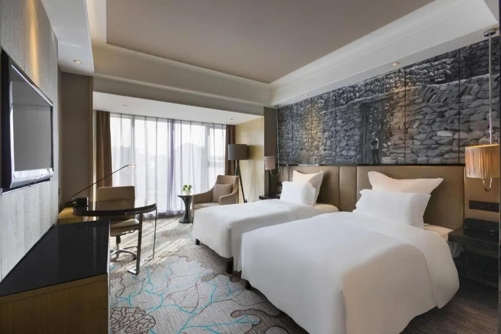 Bed in U Hotel Urumqi