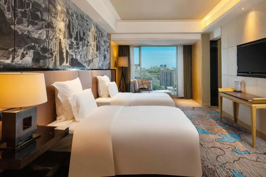 Bed in U Hotel Urumqi