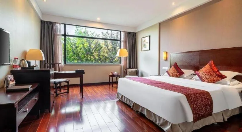 Bed in Ramada by Wyndham Suzhou Luzhi