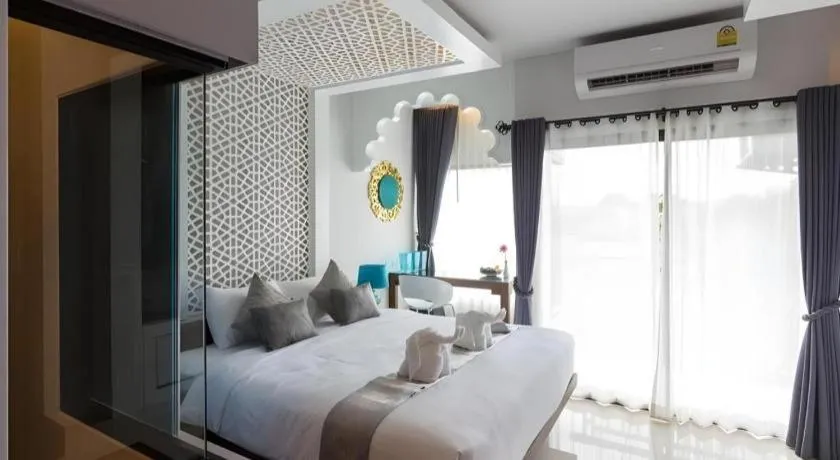 Bed in Vulcano Hotel at Nimman