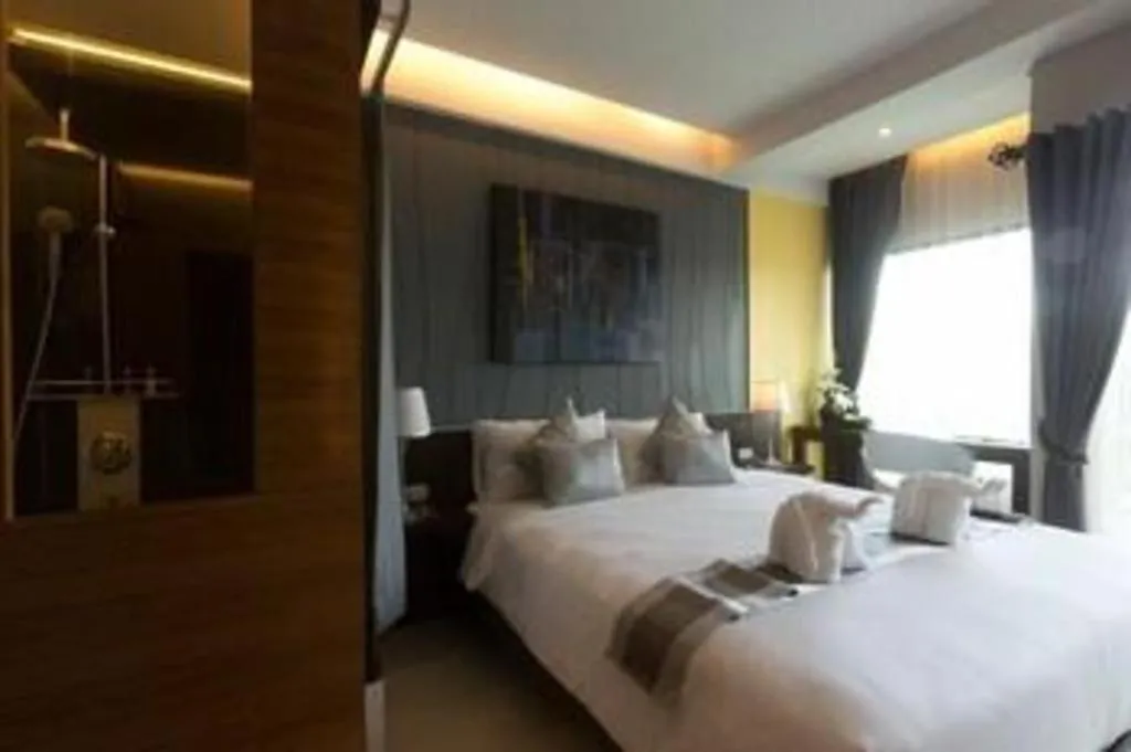 Bed in Vulcano Hotel at Nimman