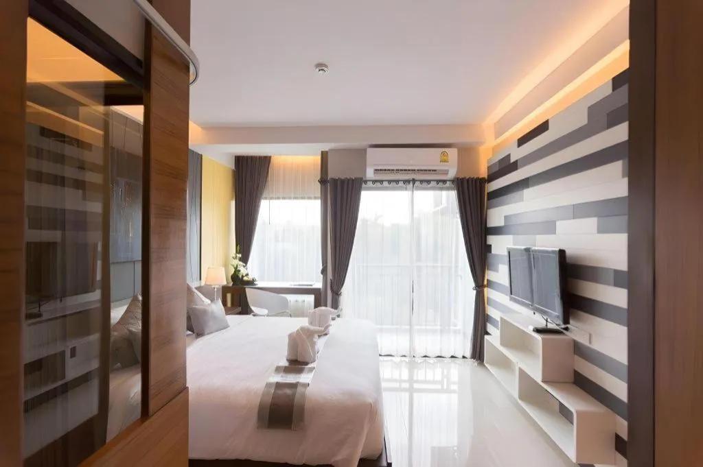 Bed in Vulcano Hotel at Nimman